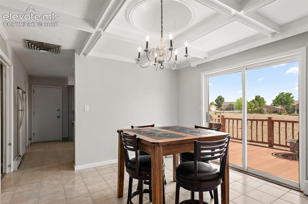 Image 15 of 31: Decorative Ceiling Details in Formal Dining