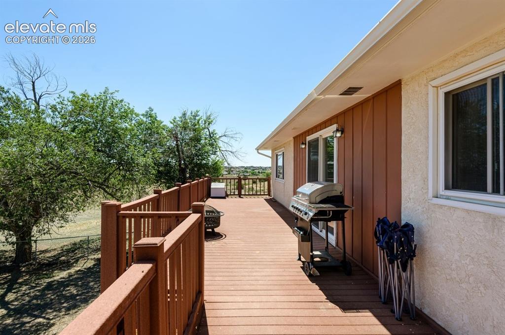 Image 22 of 31: Composite Deck accessed from Dining Room