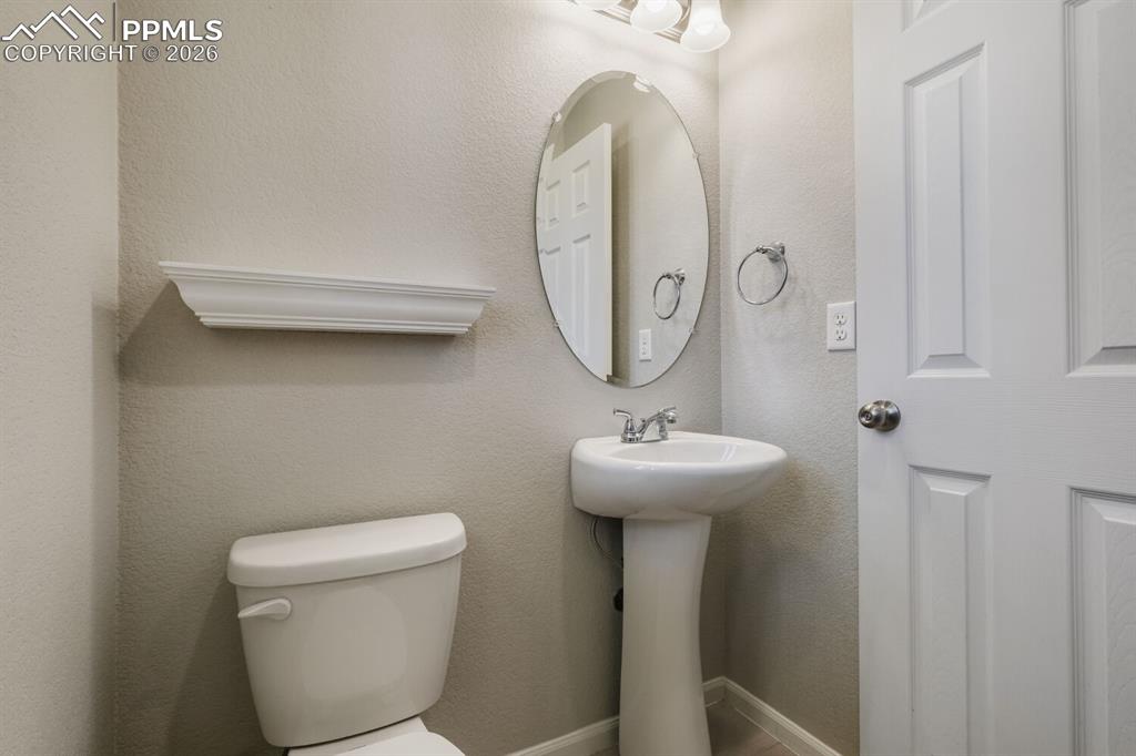 Image 14 of 37: man level powder room