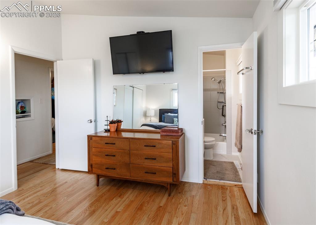 Image 21 of 50: Master Bedroom