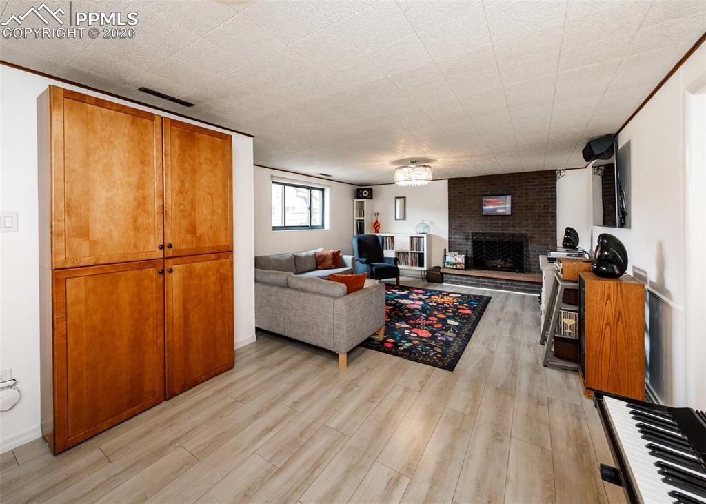 Image 29 of 50: With wood burning fireplace