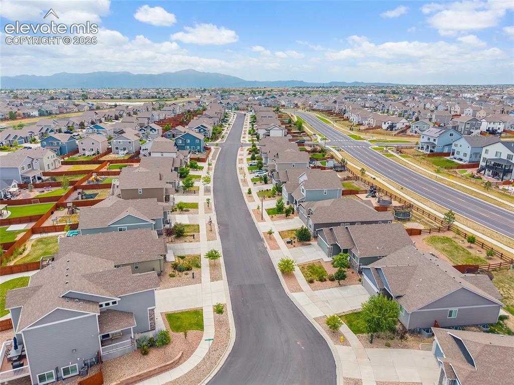 Image 49 of 49: Residential neighborhood featuring numerous single-family homes with pitche