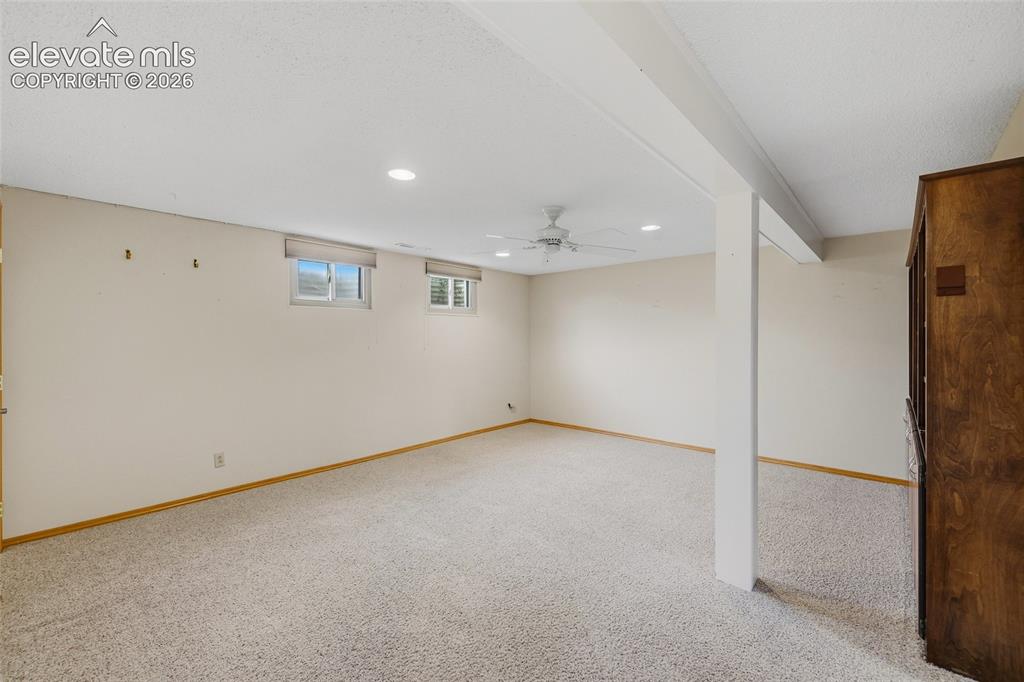Image 19 of 43: Carpeted room with recessed lighting and a ceiling fan