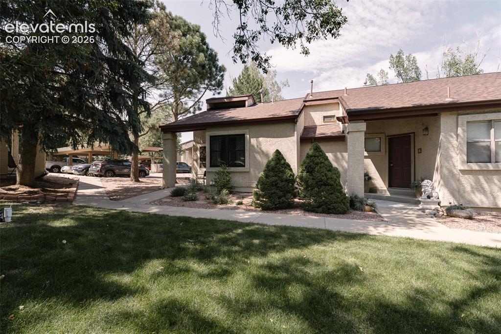 Caption: Impeccably maintained 2 bedroom, 1 bath end unit condo on the beautiful west side of Colorado Spring