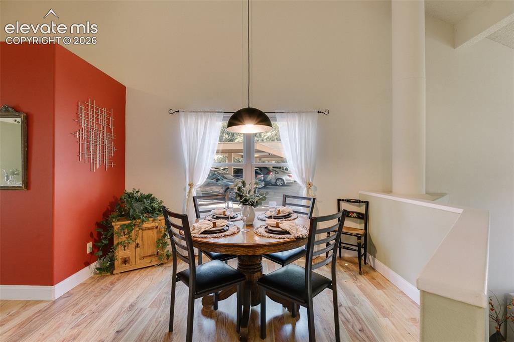 Image 11 of 27: The dining area is conveniently located off the kitchen for easy entertaini