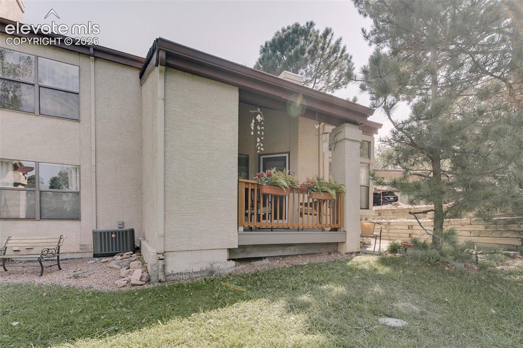 Image 23 of 27: Covered deck to enjoy the beautiful Colorado sunshine.