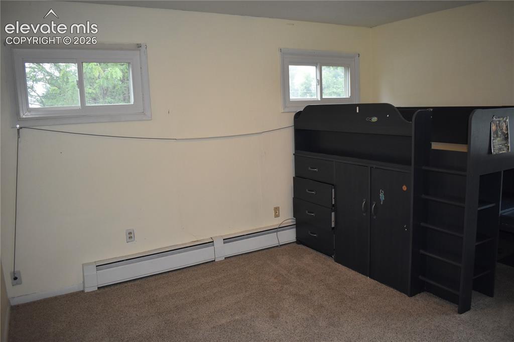 Image 10 of 33: Bedroom