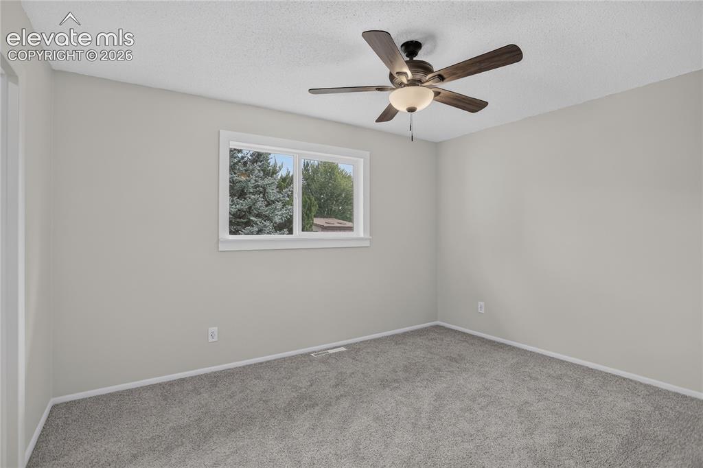 Image 11 of 26: Primary bedroom - main level