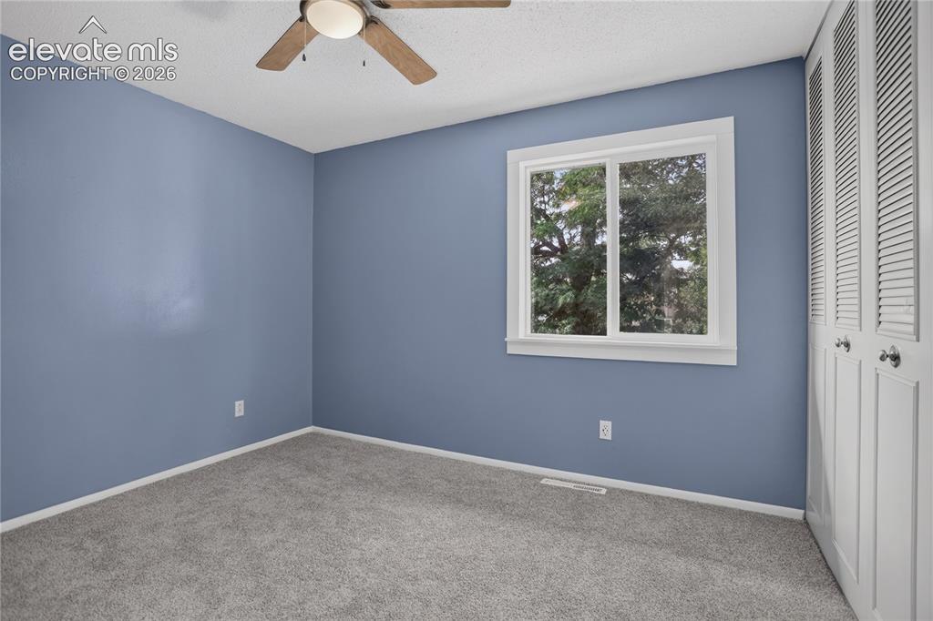 Image 14 of 26: Bedroom 2 - main level