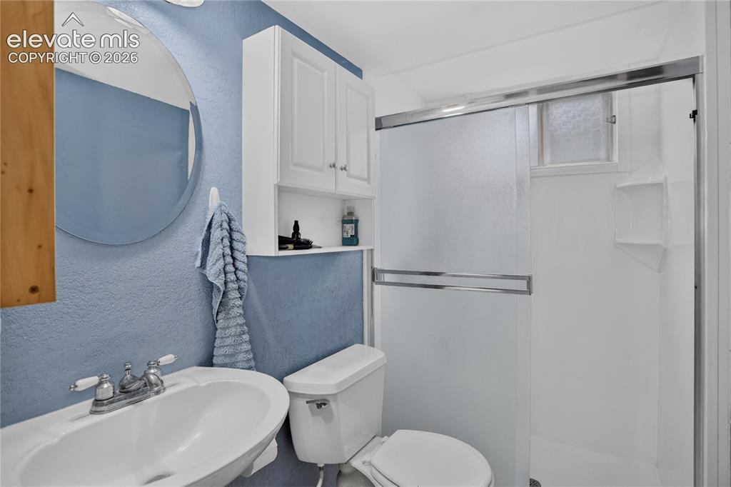 Image 22 of 26: Guest bath - lower level