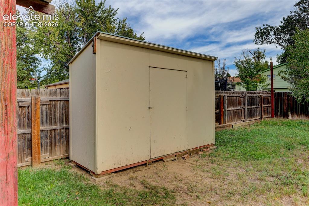 Image 24 of 26: Storage shed