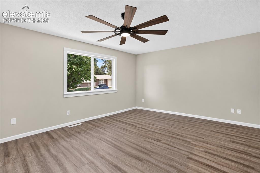 Image 5 of 26: New LVP flooring in main living spaces