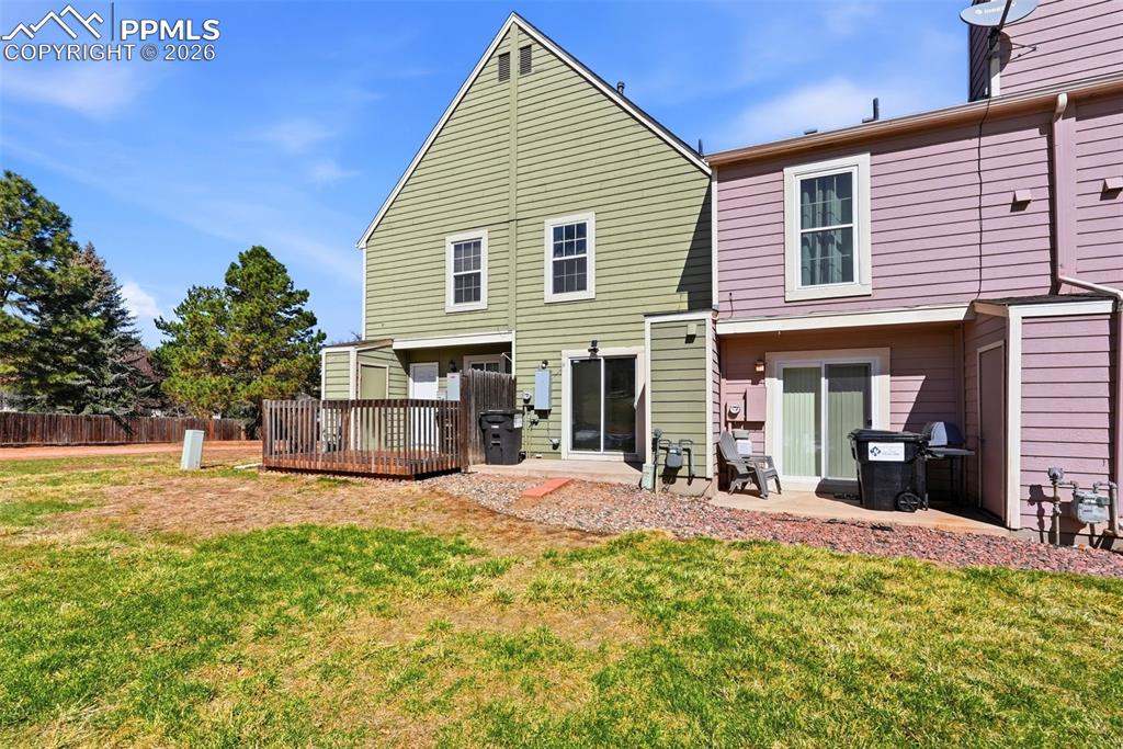 Image 42 of 44: Rear view of house featuring a patio area and a deck