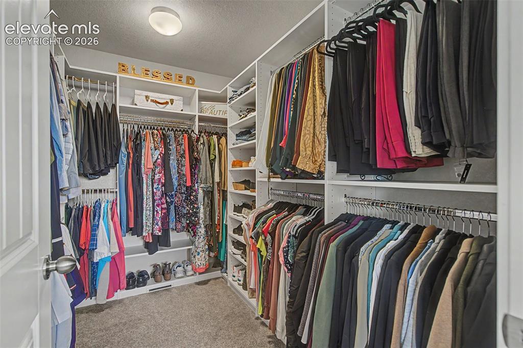 Image 23 of 40: The beloved, recently re-done custom closet.  Perfect organization is yours