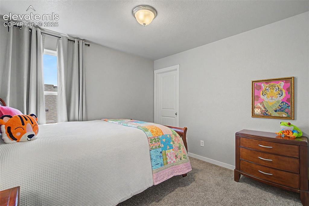 Image 28 of 40: Another room with a generous closet.  As in, you can walk in. Nice. 