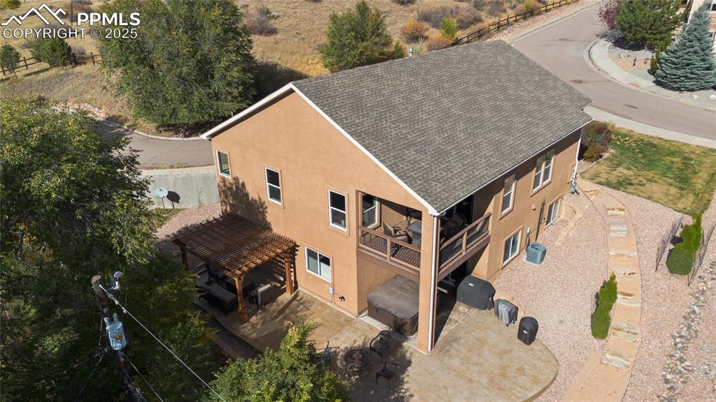 Image 6 of 41: Composite Decking and stamped concrete patio with Hot Tub!