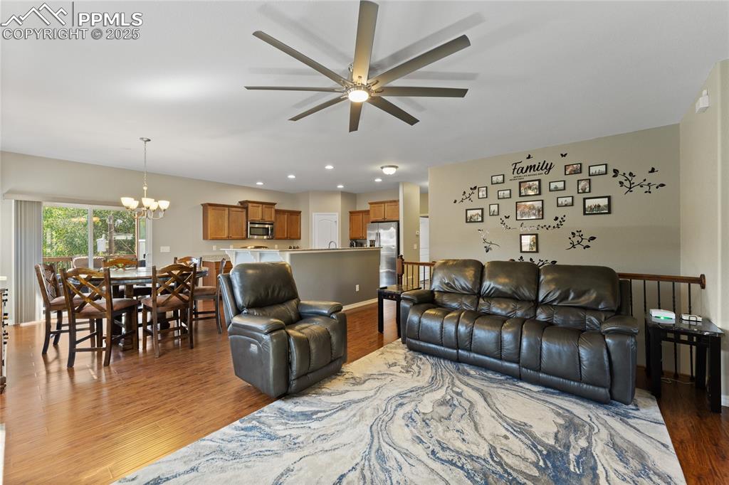 Image 9 of 41: Open Floor Plan. Walkout to Covered Deck. 10 Foot Ceilings! Durable Enginee
