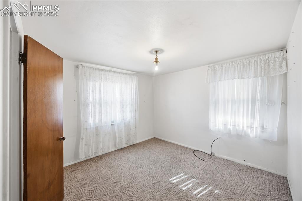 Image 11 of 19: Bedroom