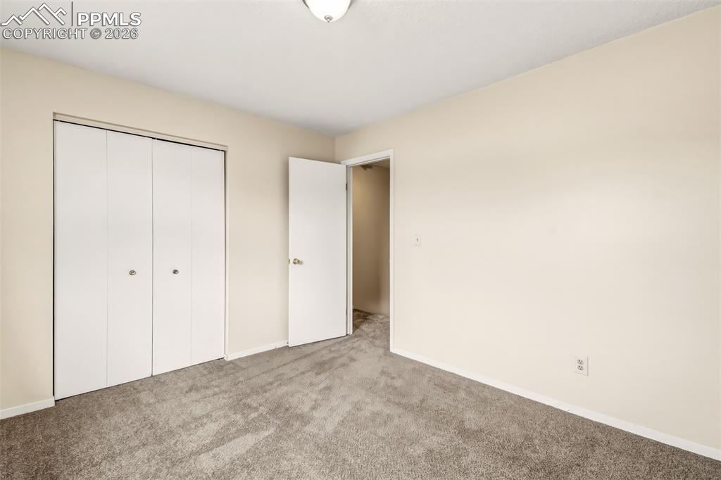 Image 16 of 20: 2nd bedroom has new paint and carpet