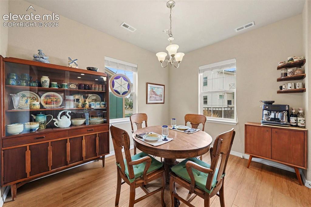 Image 11 of 26: Bright and sunny dining area