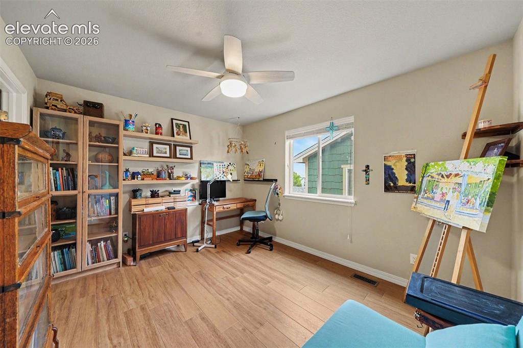 Image 16 of 26: Roomy second bedroom offers another space that could be used for something 