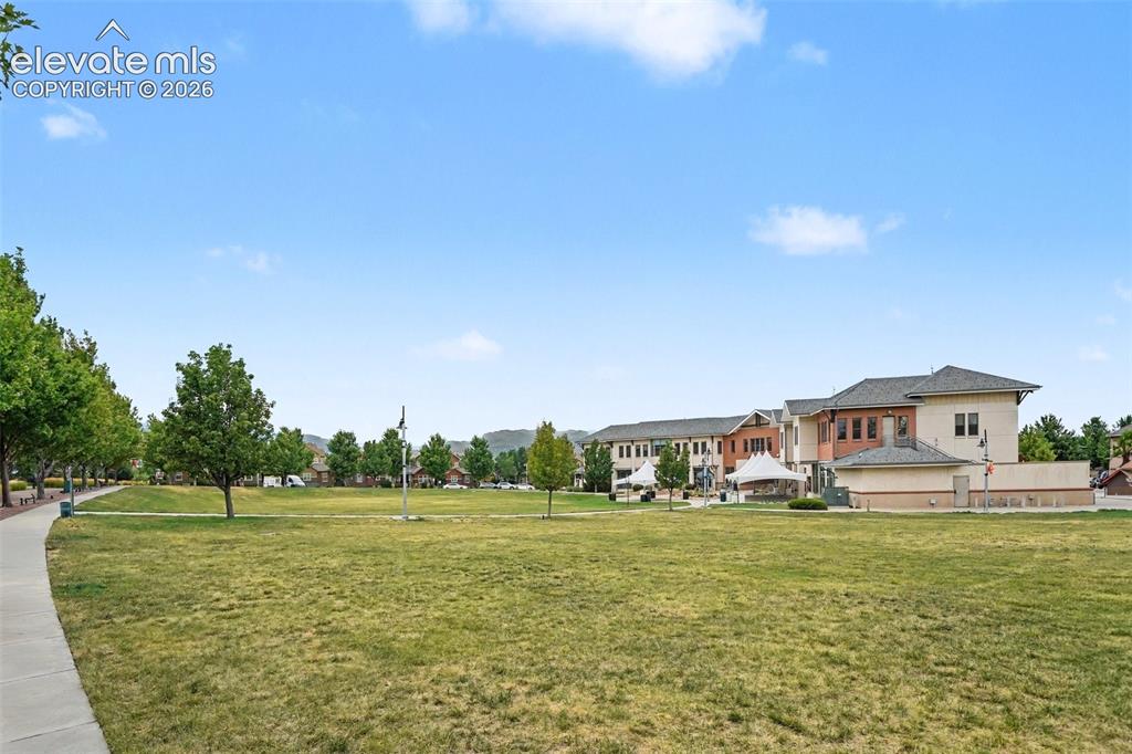 Image 22 of 26: Expansive community area where children can play, outdoor music concerts, p