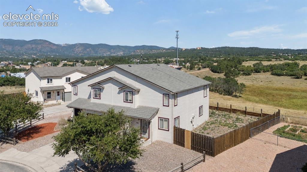 Image 2 of 11: AERIAL OF FRONT OF DUPLEX - EAST SIDE