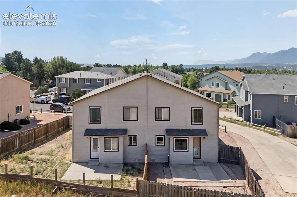 Image 7 of 11: BACK OF HOME - LEFT SIDE IS 