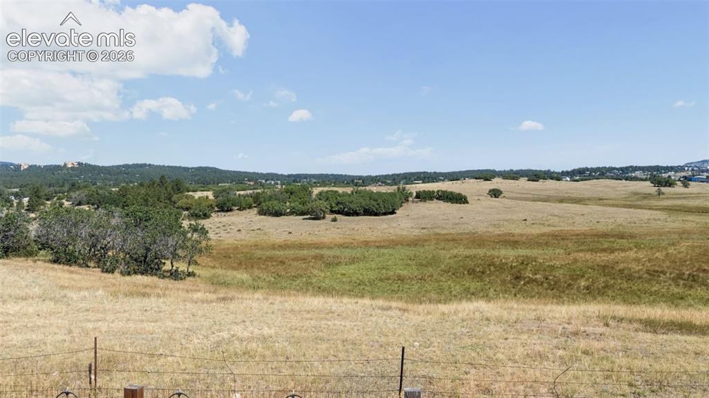 Image 8 of 11: BACKS TO OPEN SPACE