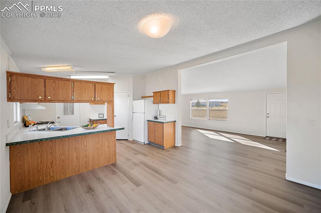 Image 16 of 34: Open to the livingroom and perfect for entertaining. 