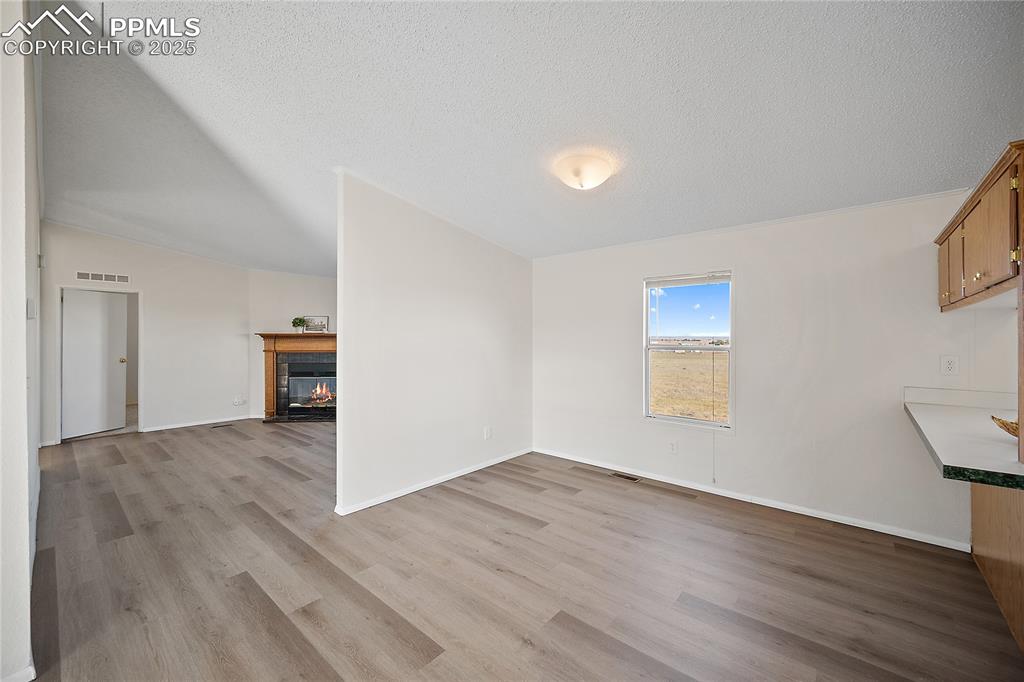 Image 21 of 34: Dining space is also semi open to the family room. 