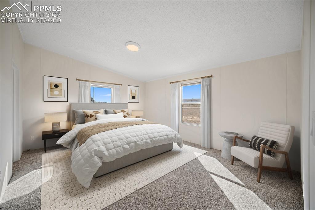 Image 8 of 34: Virtually Staged Primary Bedroom