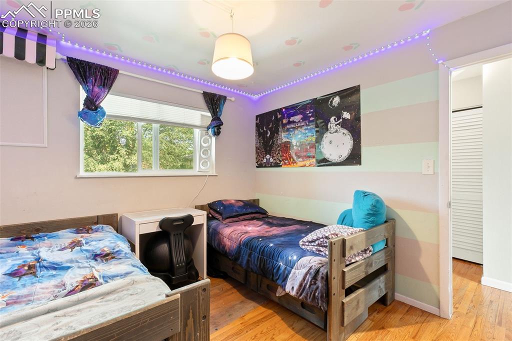 Image 23 of 38: Bedroom featuring wood finished floors