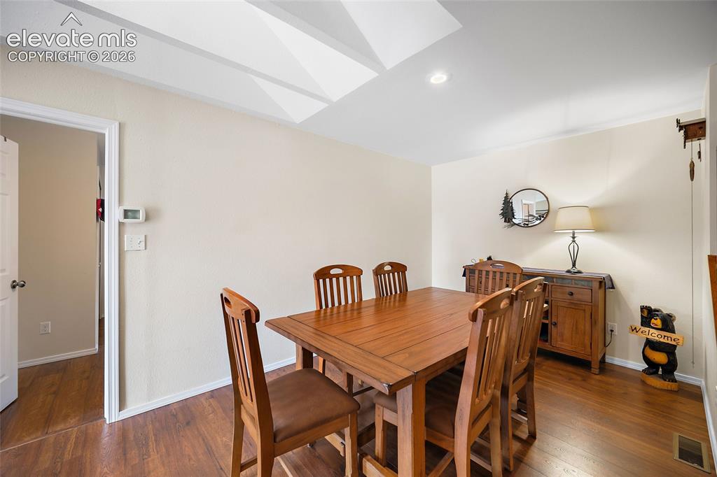 Image 15 of 44: Tray ceiling with recessed lighting