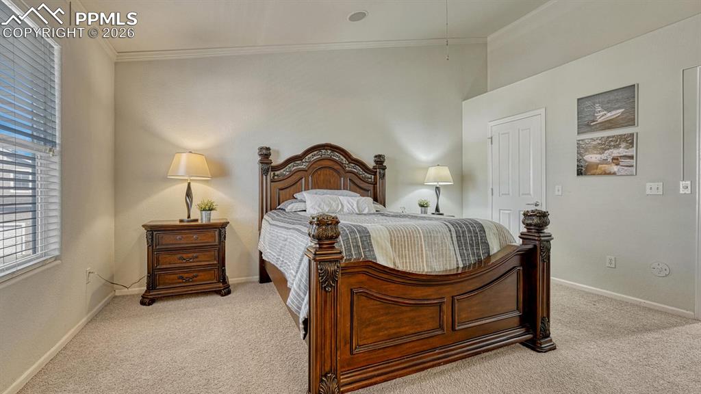 Image 13 of 24: Large Primary Bedroom Walk In Closet!
