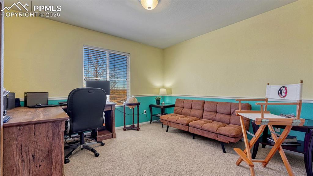 Image 19 of 24: Large Secondary Bedroom looks out to neighborhood park and pond!