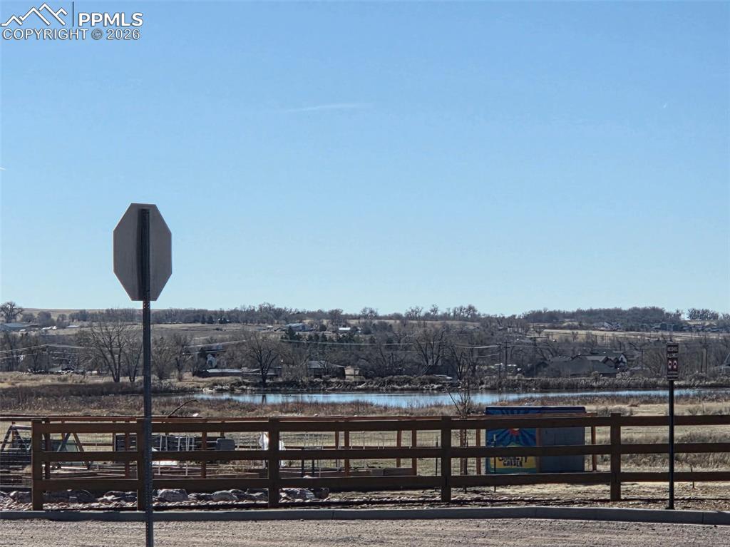 Image 22 of 24: Neighborhood park and pond!  Rare water view in CO! Trails!!!