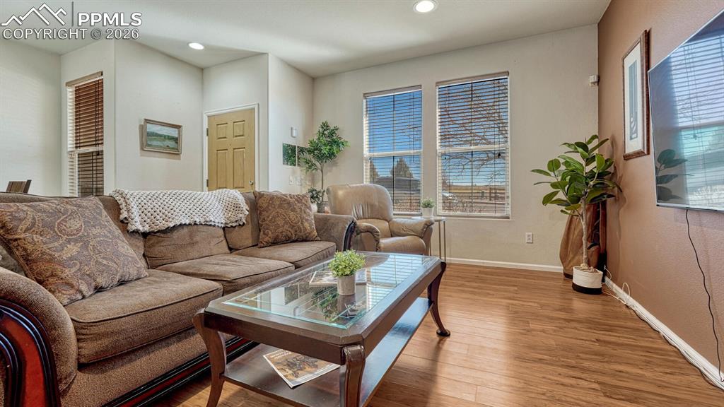 Image 7 of 24: Hardwood floors throughout main level.