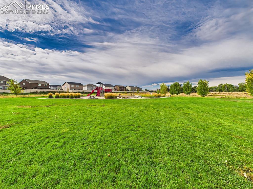 Image 44 of 50: Neighborhood Park – Expansive green space just around the corner featuring
