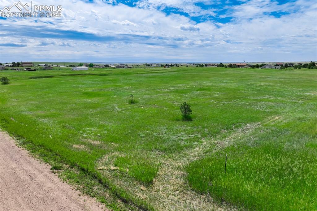 Image 12 of 20: View of undeveloped land with rural landscape