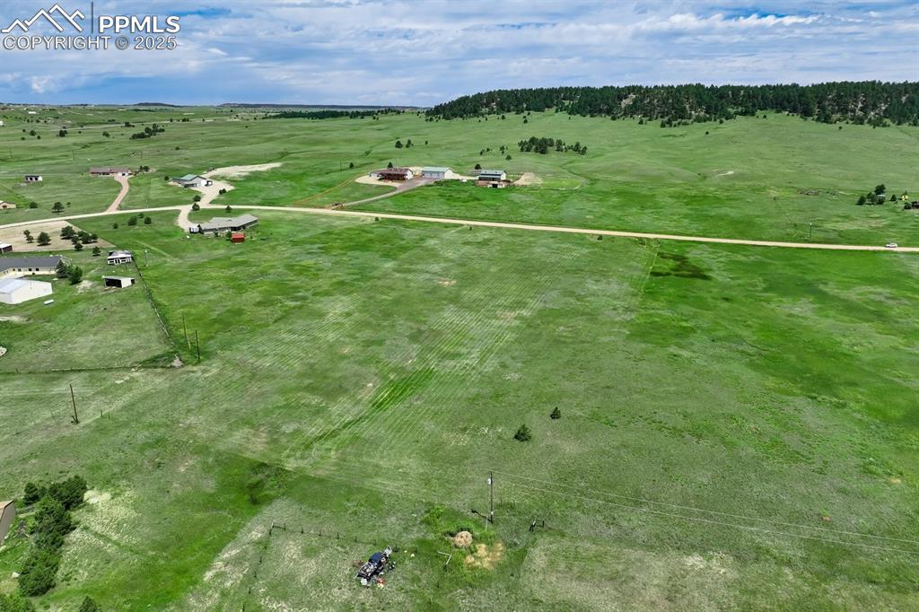 Image 5 of 20: Overview of rural landscape featuring property parcel outlined