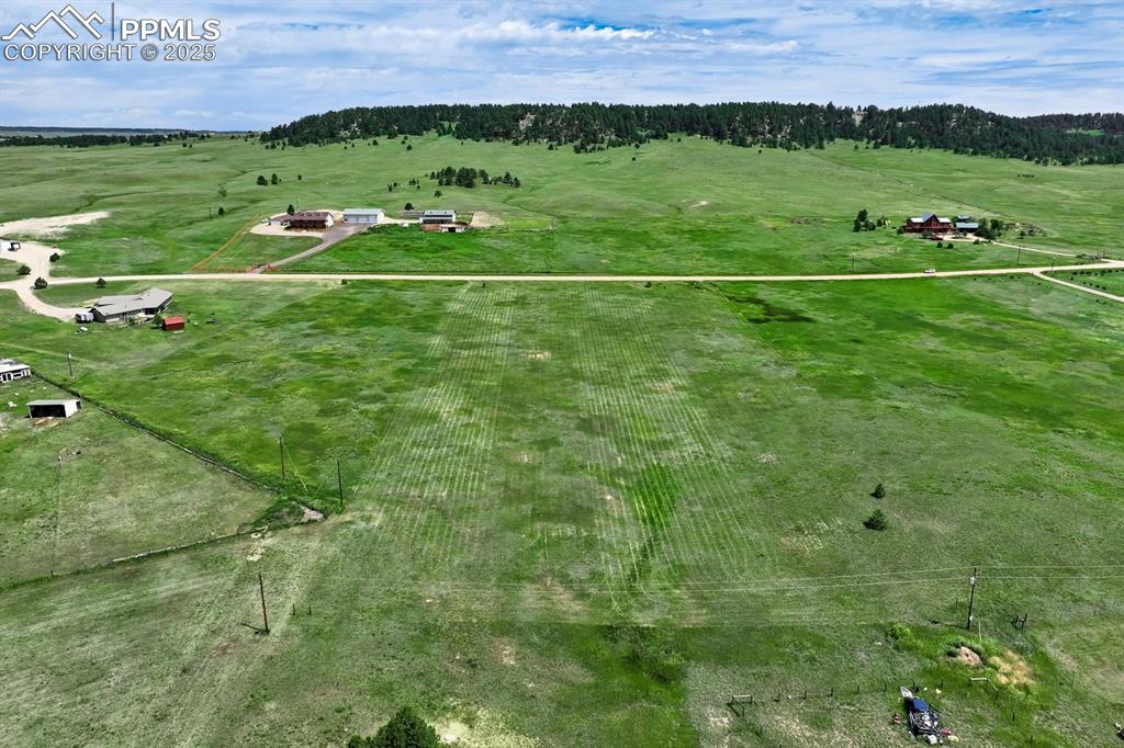 Image 6 of 20: View of rural area featuring property parcel outlined and a pastoral area