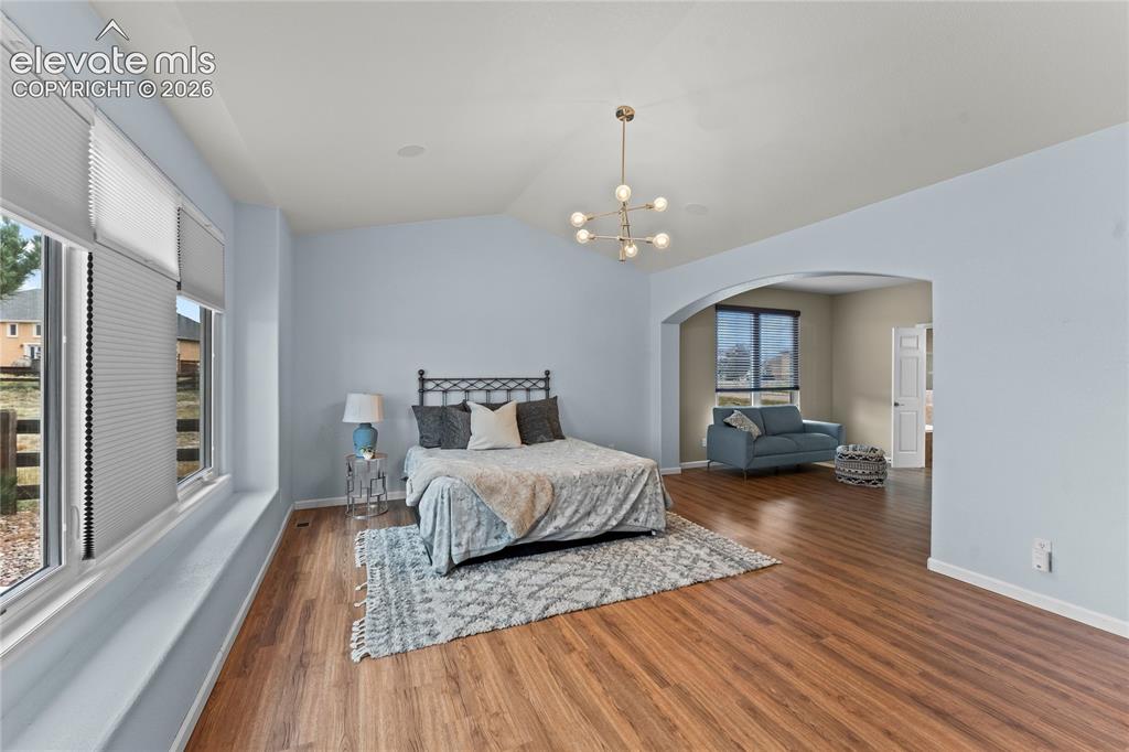Image 12 of 36: Huge Primary Bedroom with sitting room or office space