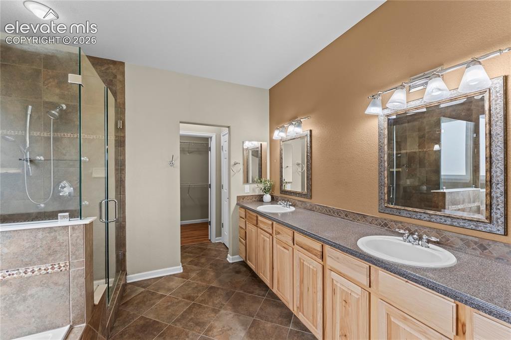 Image 14 of 36: Primary Bathroom with soaking tub and stand alone shower