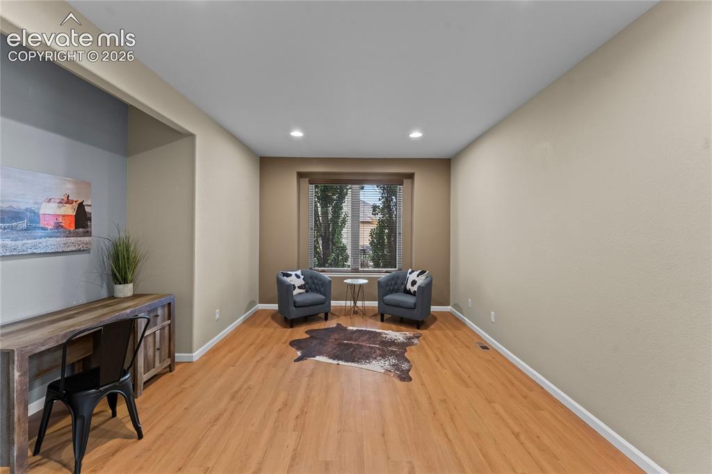 Image 20 of 36: Private Flex space staged as office with French doors