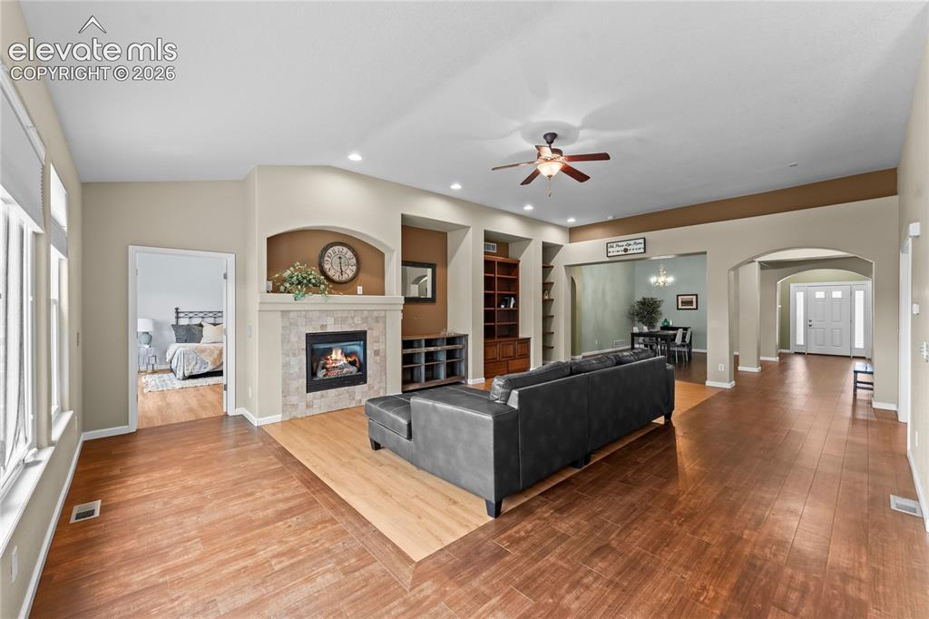 Image 4 of 36: Main level living and primary Bathroom entrance
