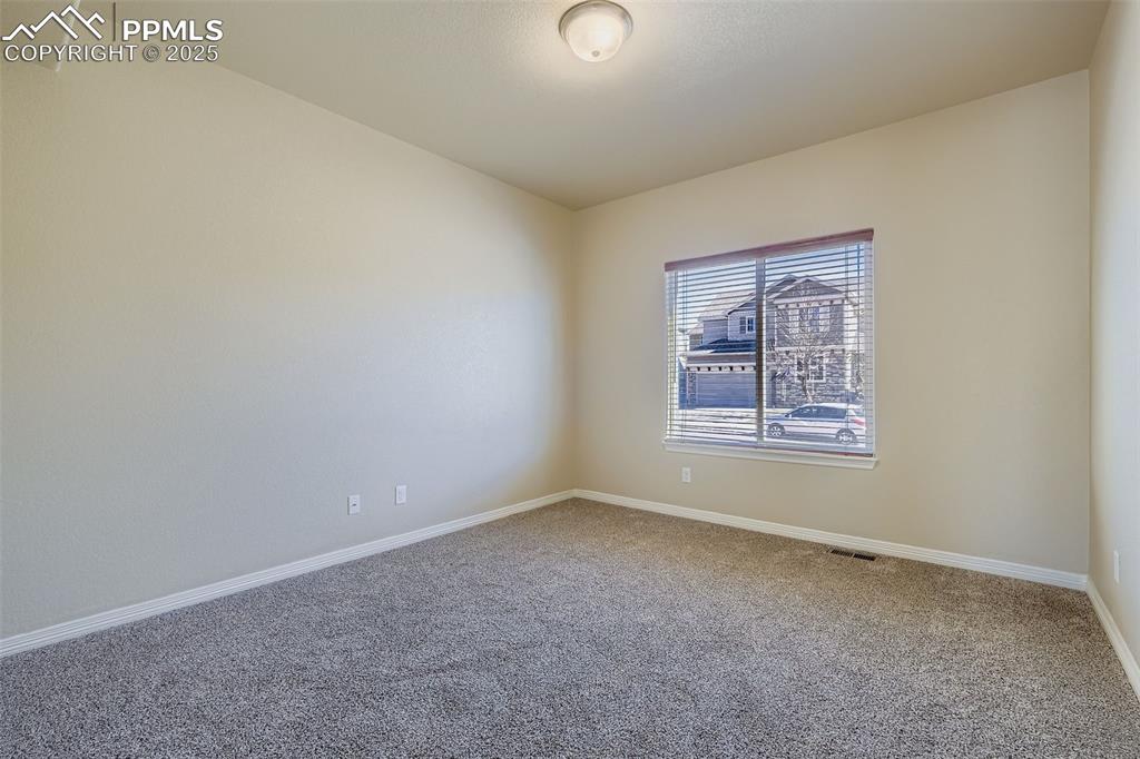 Image 12 of 49: main level office, looking east