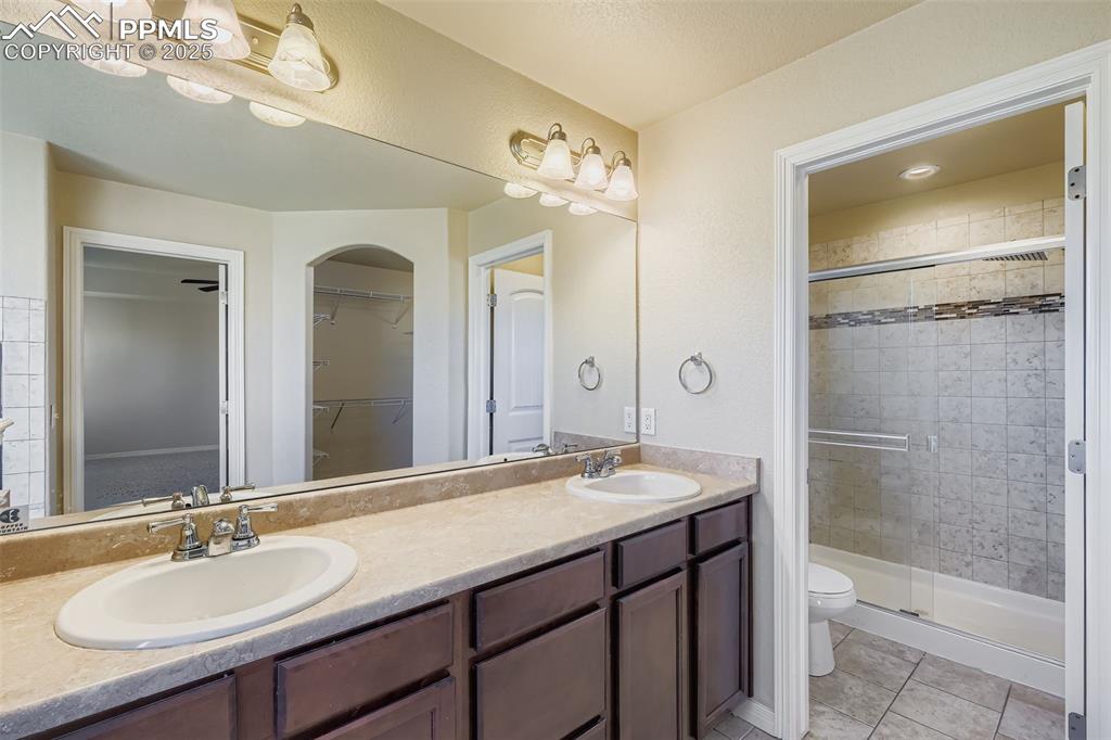 Image 19 of 49: Primary Bathroom standing shower