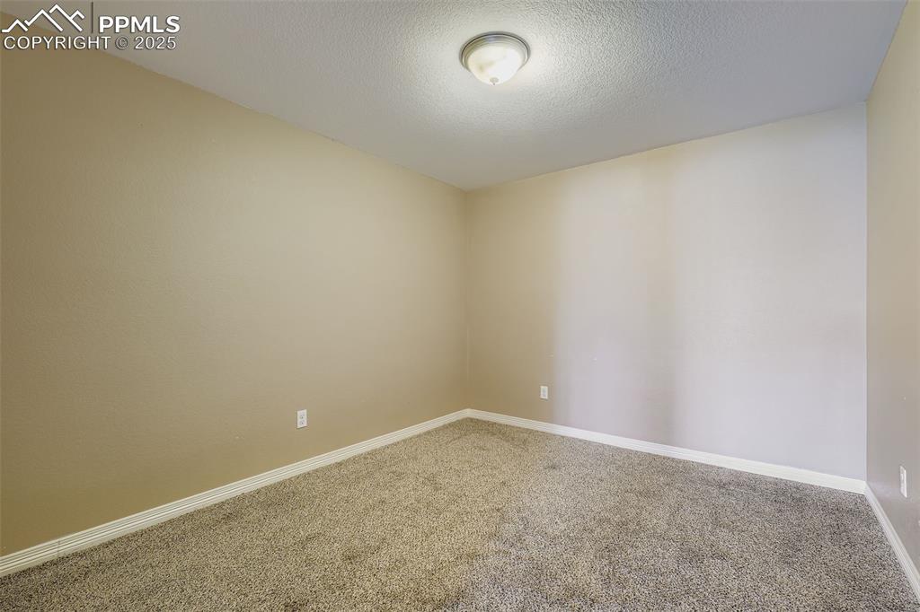 Image 37 of 49: flex room or 6th non-conforming bedroom