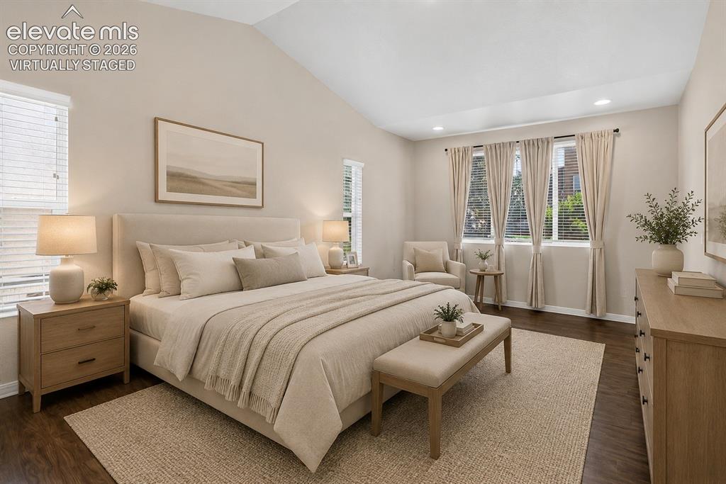 Image 17 of 50: Virtually Staged - Vaulted ceiling, recessed lighting, dark wood-finish flo